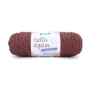 A single skein of Grundl Hello Again yarn in a dusty rose-brown shade, wrapped with a white paper label, on a clean white background.
