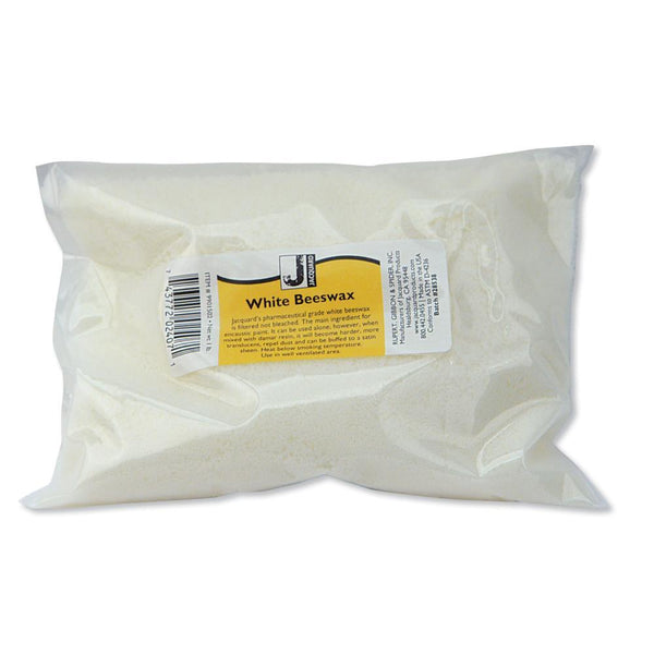 Bag of white beeswax with a label on a white background