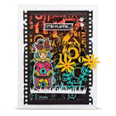 A square handmade card featuring a colorful folk-art style girl illustration, yellow paper flowers, turquoise floral accents, and layered collage text and graphics on a black background, set against a clean white backdrop.