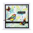 A square handmade greeting card featuring a colorful bird and butterflies on a patterned background with black borders and the text 'BEAUTY ABIDUMUS'.