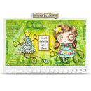 A square mixed-media art card or scrapbook paper featuring a whimsical Christmas illustration. The design shows a cartoon girl with brown hair, a flower in her eye, and a decorated Christmas tree, alongside text reading 'twinkle all the way' and 'tinsel twinkle and cheer'.