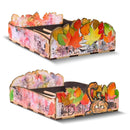 Two cardboard hats with autumn leaf and animal designs on a white background