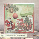 Christmas-themed card with Santa Claus, ornaments, and text on a wooden surface.