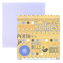 A sheet of double-sided scrapbooking paper from BTDT Designs, featuring a yellow and light blue patterned side with travel-themed text and graphics, and a solid light purple dotted reverse side.
