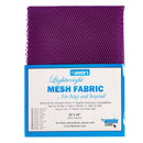 A sheet of purple lightweight mesh fabric displayed above its blue and white retail packaging label by Annie's.
