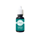 A small bottle of Cutting Paper Design Sea Glass premium dye ink, featuring a teal label and white cap on a solid white background.