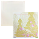 Two sheets of Doublestack paper from the Margot collection, one showing the lined cream-colored writing side and the other showing the decorated side with a gold damask pattern, white birds, and pink blossoms.