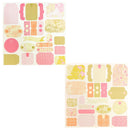 Two sheets of decorative scrapbook paper with vintage-inspired patterns in pink, yellow, and beige, displayed on a clean white background.