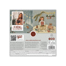 Back packaging of 'A Kind of Paper' cardstock set by The Paper Consortium, featuring a rustic holiday-themed illustration with a girl, teddy bears, and a woman on the cover, alongside product specifications, a QR code, and branding on a light gray background.