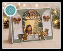 A handmade Christmas-themed card featuring a central photo frame with a girl by a tree, surrounded by layered birch wood textures, striped bows, and cute mouse cutouts. The card is displayed on a wooden surface with a festive blurred background of lights and pinecones.