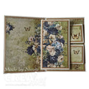 A handmade vintage-style scrapbook card set displayed open on a white background. The set includes a large central card with blue and cream roses, a clock face, and butterflies, alongside two smaller coordinating cards.