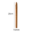 A wooden crochet hook shown vertically on a white background with dimension labels indicating 20 cm length and 15 mm tip size.
