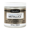 A jar of DecoArt Americana DECOR Metallics bright metallic paint in a silver shade, with a white lid and a brown and white label.