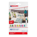 Packaging of edding textile pens with colorful markers on a couch background