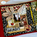 A close-up of a handmade scrapbook album page featuring autumn-themed embellishments, including layered leaves, a squirrel photo, an apple label, and the text 'Notable November' on a black-and-white patterned background.