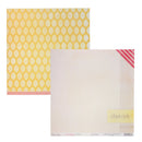 Two square scrapbook paper sheets from Elle's Studio. One sheet features a yellow and cream geometric pattern with a pink striped border, and the other shows a light pink grid pattern with a pink and white striped corner and a yellow label reading 'cher-ish'.