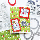 A festive handmade holiday card set displayed on a white background with coordinating clear stamps and metal die templates. The main card features a green Christmas lights pattern with two red scalloped frames containing snowman illustrations and the phrase 'ALL IS Merry and Bright?'.