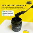 Gelelf acrylic paint jar with a brush dripping paint, on a yellow background