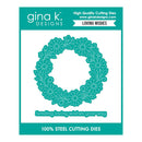 Gina K. Designs steel cutting dies package featuring a teal floral wreath die and matching text die that reads 'Sending loving wishes your way' on a white background with teal branding panels.