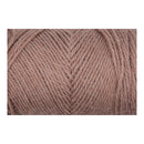 A close-up of a dusty rose or mauve-colored yarn wound into a skein, showing the detailed texture of the twisted plies against a solid white background.
