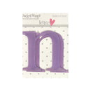 A purple plastic letter 'n' from the Pocket Scraps 'Letters' set by Heidi Grace Designs, shown on its original backing card against a white background.