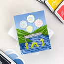 Greeting card with dragons and fireworks design on a white surface