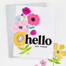 Greeting card with colorful flowers and 'hello hey there' text on a white background