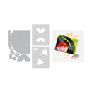 A flat lay of craft dies on a white background, featuring a vinyl record and LP template set alongside a decorative paper sample card with the text 'SOLID GOLD' and 'Love'.