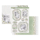 A set of Christmas-themed scrapbooking paper sheets and coordinating sticker sheets. The designs feature vintage-style frames, a snowman illustration, floral borders, and phrases like 'Merry Christmas' and 'Winter Wonderland' in soft sage green, white, and gray tones.