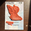 IndigoBlu rubber stamp with a fairy design on a branded card.