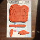 IndigoBlu rubber stamp set on a wooden surface