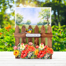 Greeting card with a wooden fence, flowers, and a bird on a scenic background