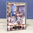 Greeting card with a motorcycle illustration and 'Wonderful Dad' text on a plaid background.