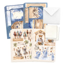 Set of Christmas cards with nativity scene illustrations and envelopes.