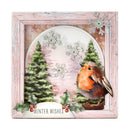 A square layered paper craft card or plaque with a distressed light pink frame. The design features a watercolor robin bird, green pine trees, silver snowflakes, holly leaves, and red berries, with the text 'WINTER WISHES' on a banner at the bottom.