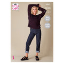 Woman wearing a dark sweater and jeans, with King Cole branding on a beige background