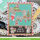 A handmade Christmas mouse-themed card featuring cartoon mice, stockings, gifts, a Christmas tree, and the phrase 'YOU'RE ON THE MICE LIST' on a striped red-and-white border, styled on a wooden surface with lace, sunglasses, and a green ink pad.