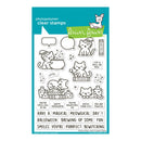 A sheet of Lawn Fawn photopolymer clear stamps featuring cute cartoon cats, spells, potions, and phrases like 'Have a Magical Meow Day!' and 'Hocus Puerus,' shown on a teal backing card.