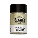 A small clear jar of Lindy's Gold 'Magical Shaker' craft glitter with a black lid and a white label, shown on a plain white background.