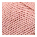 Close-up of pink yarn on a white background