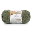 Ball of green yarn with a label on a white background
