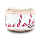 A single ball of Mandala yarn with a variegated color pattern of pink, beige, and cream, wrapped in a white paper label with red script text.