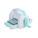White and turquoise die cutting and embossing machine on a white background