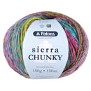 A ball of Patons Sierra Chunky yarn with a white paper label, showing a variegated color pattern of pink, blue, green, yellow, and orange on a white background.