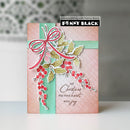 A handmade Christmas greeting card by Penny Black, featuring a pink patterned background, a mint green vertical ribbon, a red ribbon bow, and layered die-cut holly and berry embellishments. The card has the text 'LET Christmas FILL YOUR heart WITH joy' and a 'papercrafting with Penny Black' logo overlay.