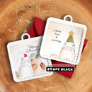 Two square handmade paper cards with scalloped edges, shown on a wooden surface with a red envelope. One card features a white cat wearing a Christmas hat with the words 'peace, love, & purring'; the other shows a white polar bear with the words 'Merry Christmas'.