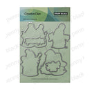 Penny Black Creative Dies steel cutting die set on a light green backing card, featuring four ghost-shaped die cutters in silver metal.