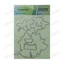 Penny Black Creative Dies steel cutting die set in its original packaging, featuring multiple die-cut metal shapes on a sage green card with the Penny Black logo.