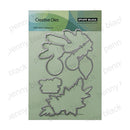 Penny Black Creative Dies set featuring four steel cutting dies in fruit and leaf shapes, presented on a light green backing card.