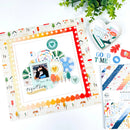 Colorful scrapbooking kit with decorative elements on a white background